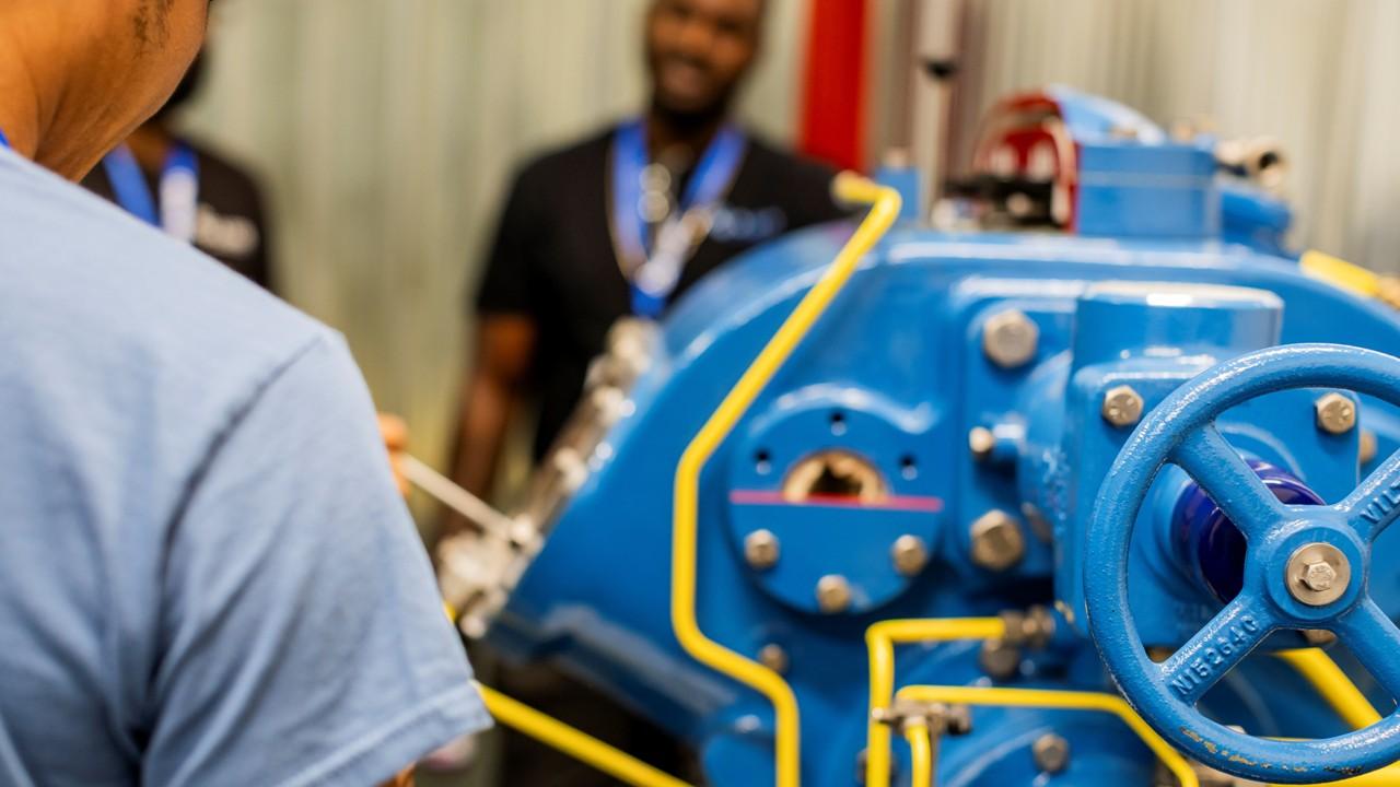 Industrial HVACR equipment displayed in a training facility
